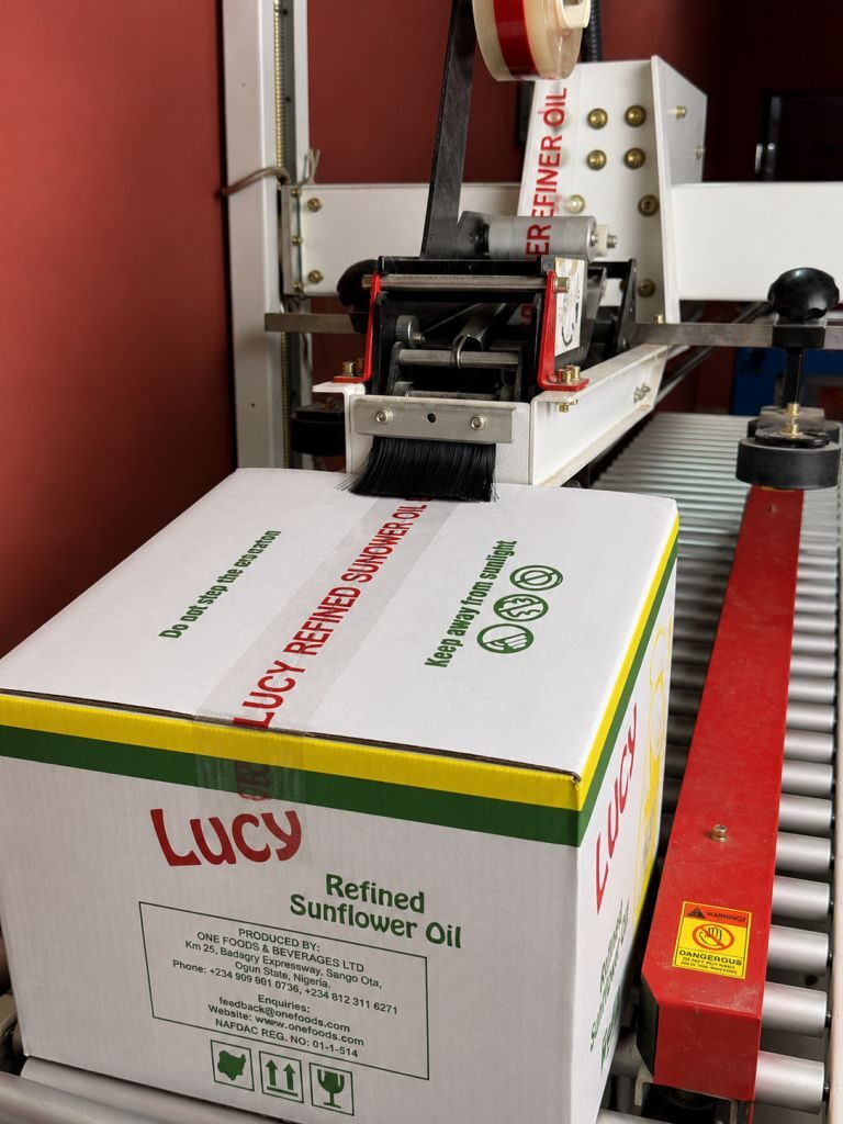 Bottles being sealed on the production line at the ONZ Foods factory
