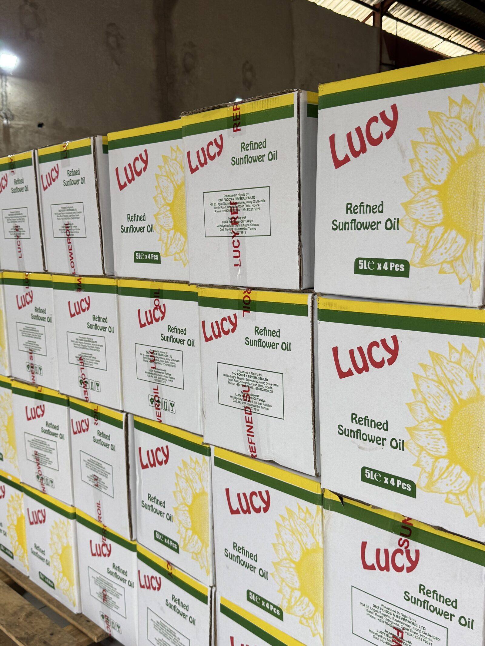 Cartons of Lucy Refined Sunflower Oil stacked at the ONZ Foods warehouse
